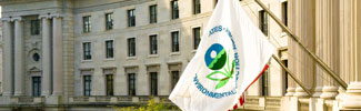 The EPA flag flying in front of the Ariel Rios Building in Washington, DC
