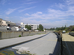 A current and common view of the LA River, cement