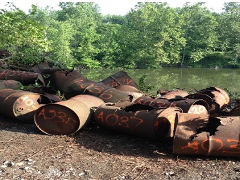 Pile of abandoned chemical drums