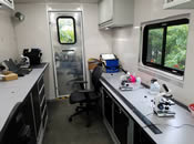 Inside EPA New England's Mobile Lab where students learned about and viewed microorganisms collected from the Mystic River.