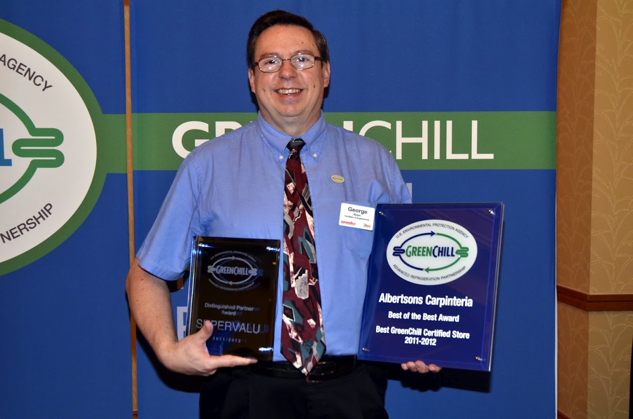 George Ronn from SUPERVALU accepts two awards from GreenChill for being a Distinguished Partner and for having the best GreenChill-certified store of the year
