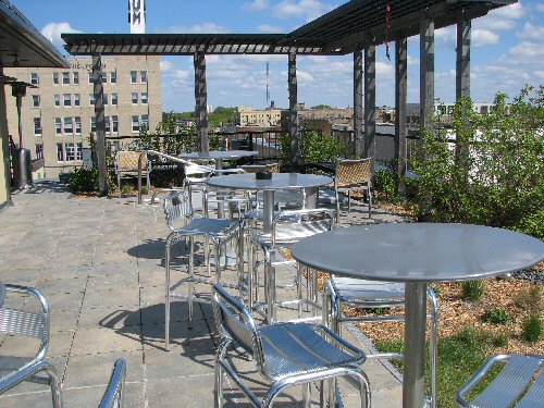 Tables and Chairs on the roof of the Hotel Donaldson's Restaurant allows guests to have a great view and enjoy benefits of the green roof.