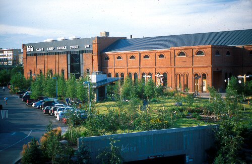 Store front of the REI parking garage in Denver, CO.