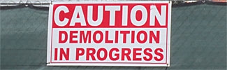 Warning sign at demolition site
