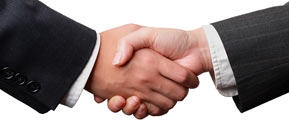 photo of two men handshaking
