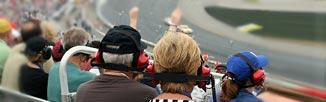 Fans watching stock car - link to For Fans page.