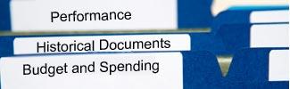 image of three file folders with the words performance, historical documents, and budget and spending