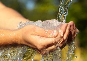 clean water pouring into hands