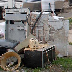 Household appliances at the curb for disposal