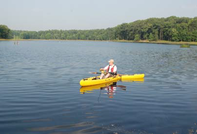 Man in a kayak on a body of water
