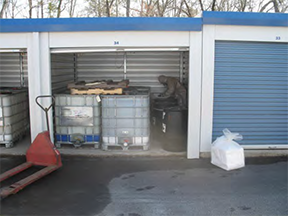 picture of hazardous waste totes in storage unit