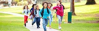 Image of school children running