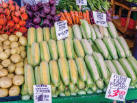 Photo: Corn, potatoes, and other vegetables for sale