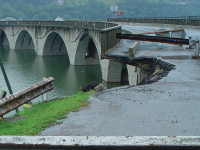 Photo: A damaged bridge is closed off.