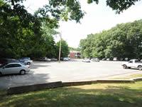 [Before Construction] View of Hurd Field parking lot looking north west (from Minuteman Bikeway)