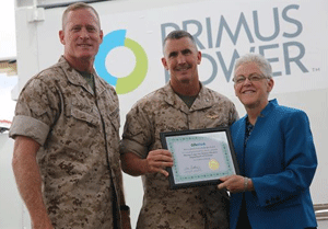 Two Marine Corp members receive the award from Gina McCarthy