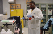 Photo of chemist performing mercury analysis.