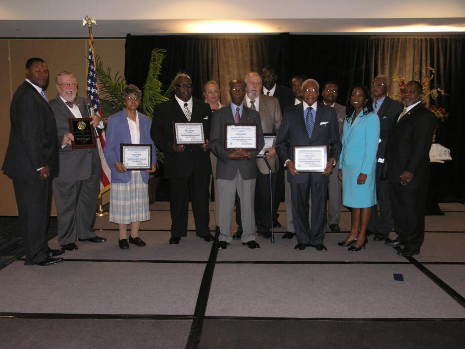 Woolfolk Alliance Group accepts the 2010 Citizen Excellence in Community Involvement Award.
