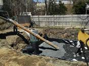Gravel Being Poured into Barnstable BMP on top of Geotextile Lining [04/29/2015]