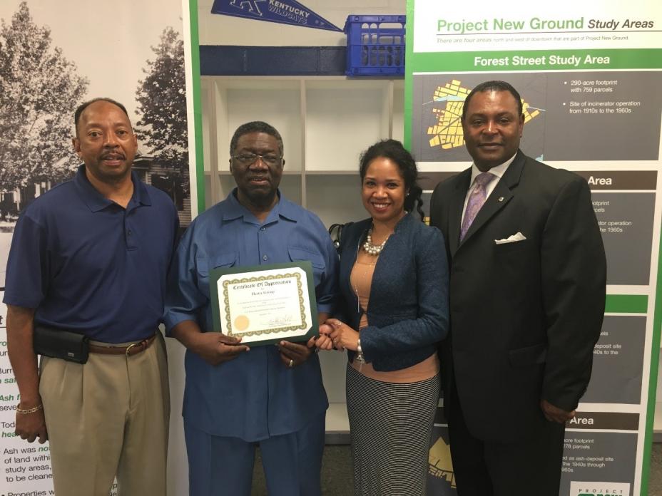 Gregory Francis, Samuel Holman, and Madelene Skinner, of the Hester Group receive an Excellence in Site Reuse certificate of appreciation from Franklin Hill, EPA Region 4