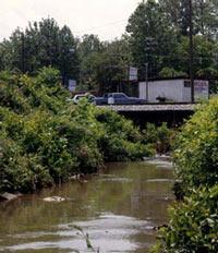 This photo shows how streams are effected by many factors due to urban sprawl and development.