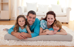 Family on floor in living room