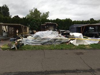 Mobile home area prior to cleanup efforts.