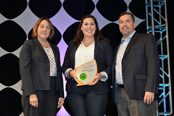 Joe Berg & Dr. Melissa Baum-Haley accept Excellence Award for Sprinkler Spruce-Up Activities for the Municipal Water District of Orange County.