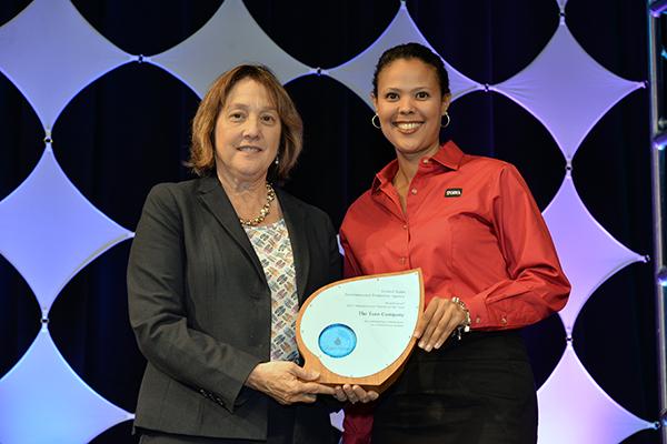 Alexis Bookman accepts Manufacturer Partner of the Year for The Toro Company