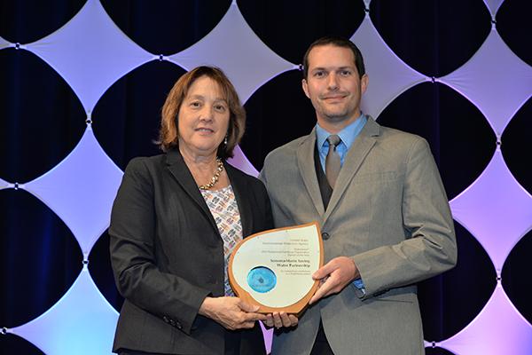 Daniel Muelrath accepts Professional Certifying Organization Partner of the Year for Sonoma Marin Saving Water Partnership.