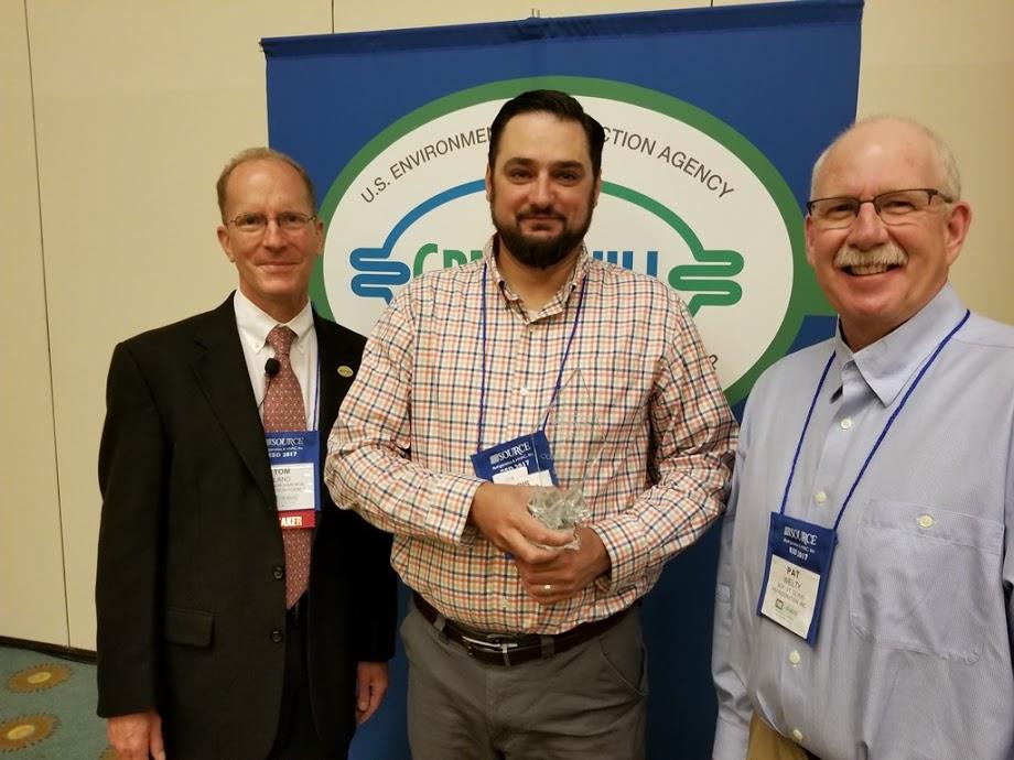 Chris Braun and Pat Welty accept Coborn’s Superior Goal Achievement recognition from Tom Land of the EPA GreenChill Program