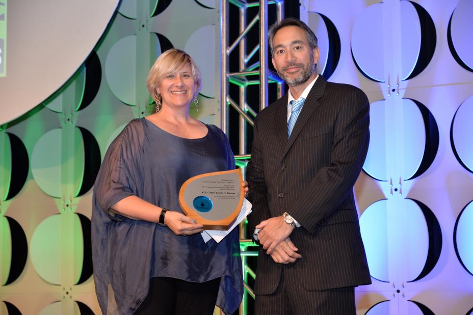 Pamela Berstler accepts Professional Certifying Organization Partner of the Year Award for G3, Green Gardens Group.