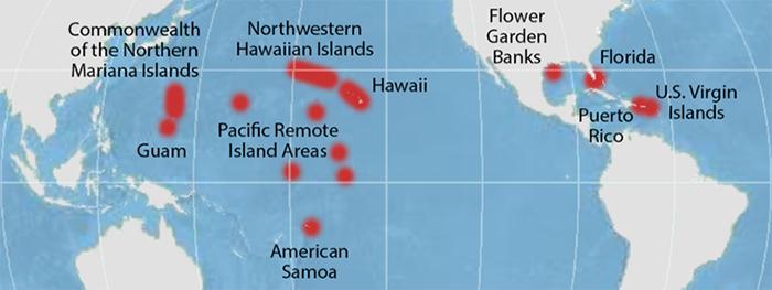 Map of the pacific and western atlantic ocean with coral reef locations marked