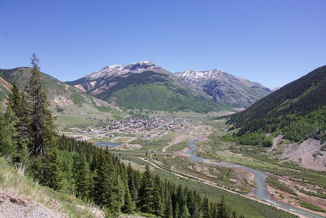 View of the town of Silverton, Colorado with the Animas River flowing in the lower right-hand portion of the photograph, taken from Highway 550.