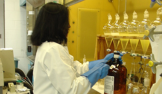 An EPA scientist conducts research in the chemistry lab at EPA’s Narragansett, Rhode Island lab.