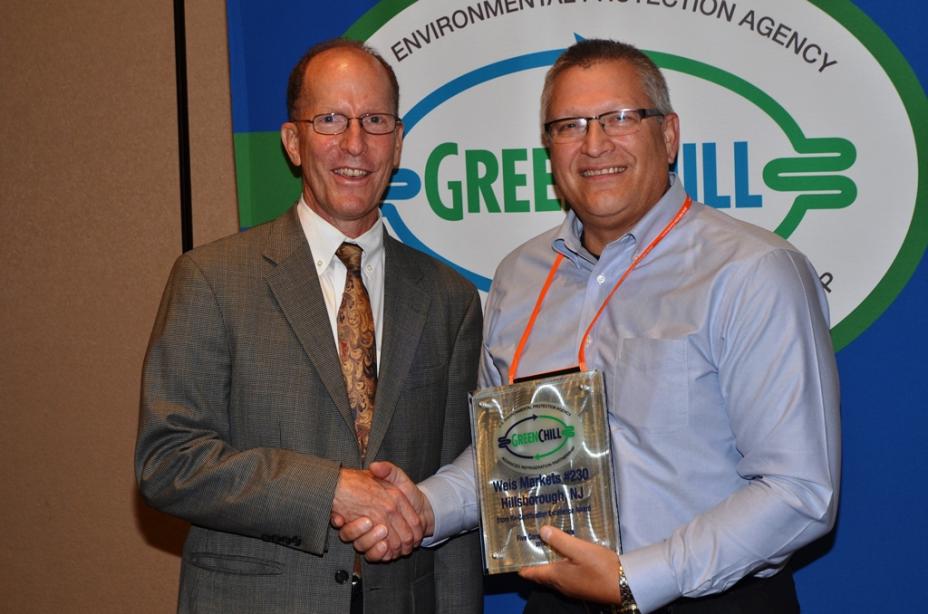 John T. Lerch accepts Weis Market's Store Re-Certification Excellence recognition from Tom Land of the EPA GreenChill Program