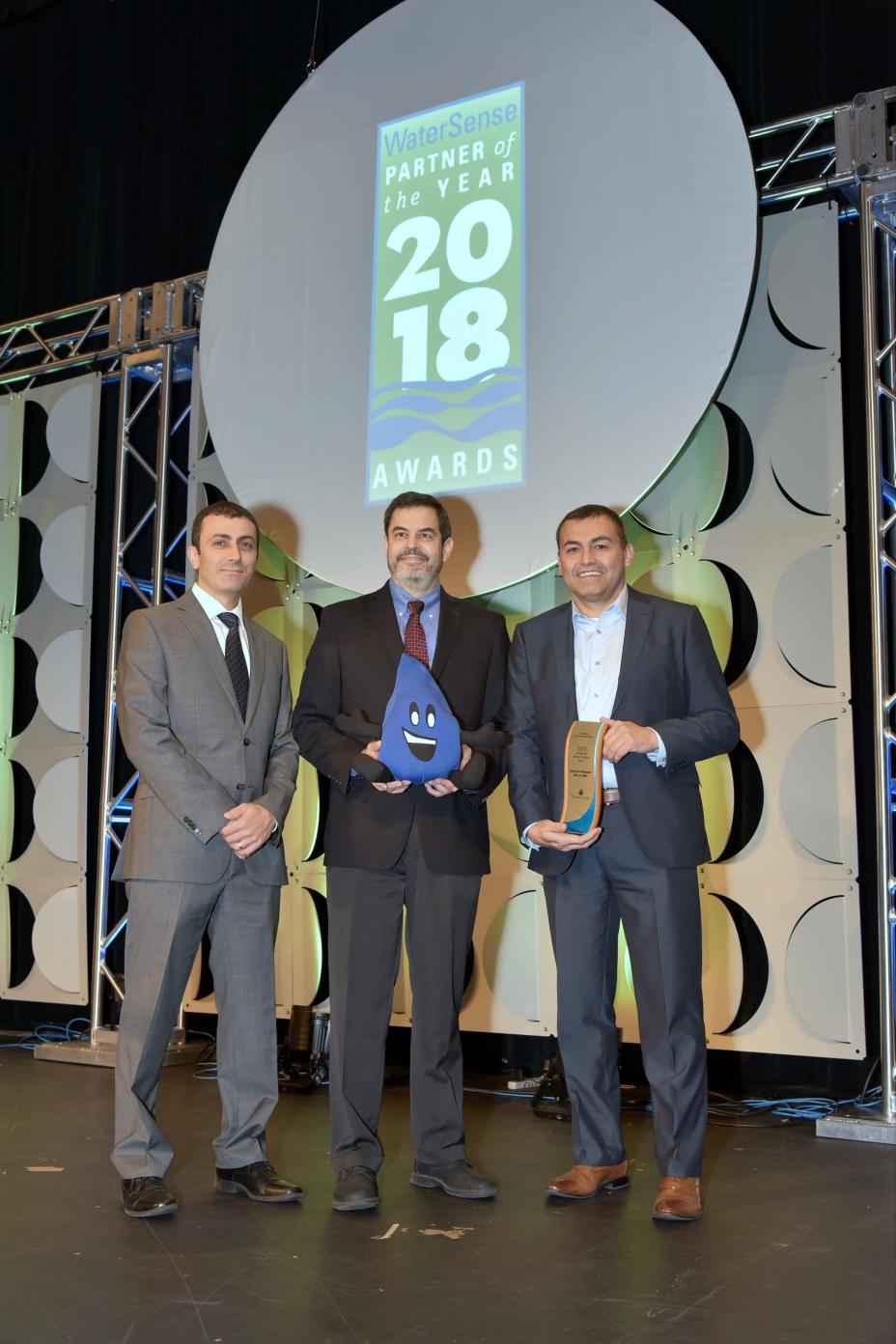 Sustained Excellence Award winner, American Standard, Part of LIXIL, with U.S. EPA's Raffael Stein.