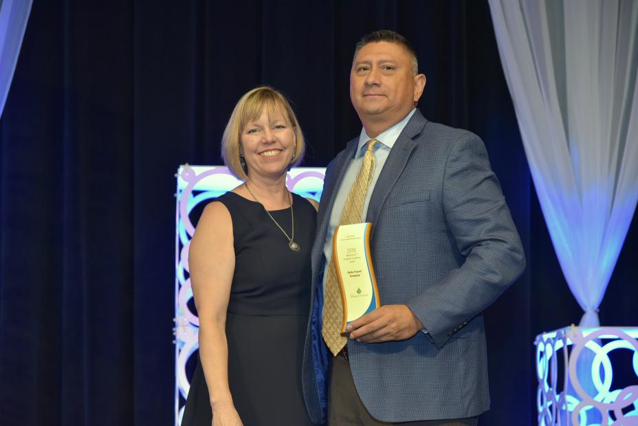 Michael Martinez accepts Sustained Excellence Award for Delta Faucet Company.