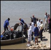 Former Administrator Jackson, EPA staff, and children from the Blue River Watershed Association at a cleanup in 2009 