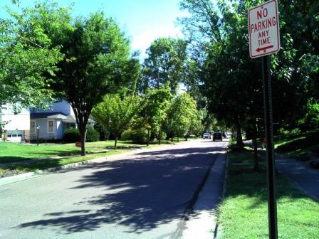 A residential street in the Cincinnati, OH metropolitan area includes street trees