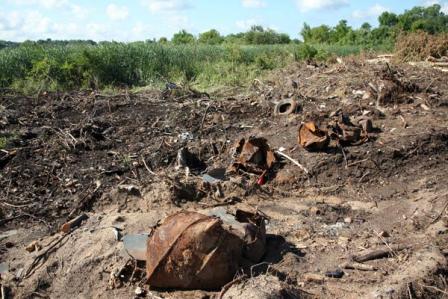 The White Lake Montague Dump site restoration was littered with rusty barrels, tires and other debris.
