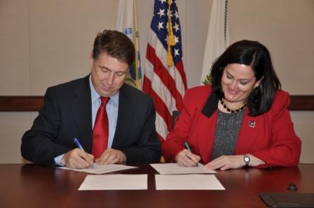 Paul Anastas and Katherine Hammack sign an MOU