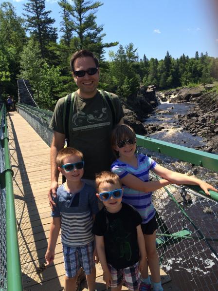 Joel Hoffman hiking with his children