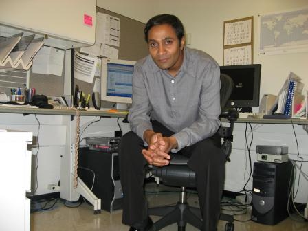 EPA's Vasu Kilaru sitting at his desk 