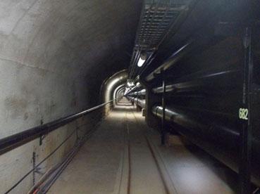 Red Hill Lower Access Tunnel with fuel pipelines running along wall.