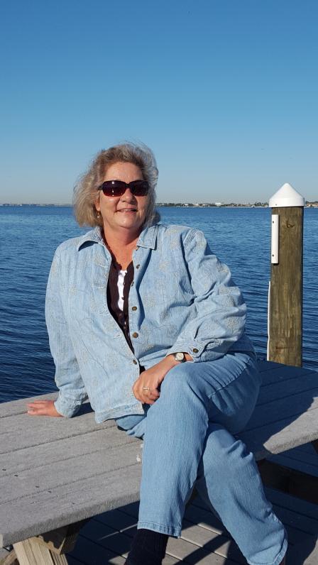 Linda Harwell outside by the ocean