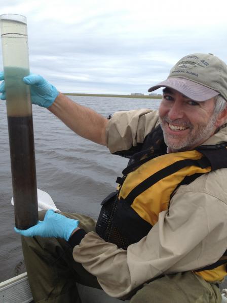 Sediment core sample collected in a corer on a small boat