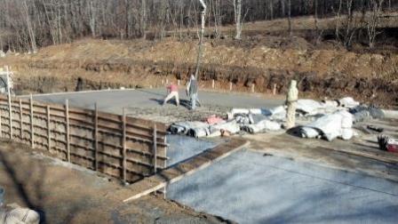 Construction of an EPA-funded cistern to satisfy irrigation needs.