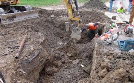 A trench where water line repair work is taking place.