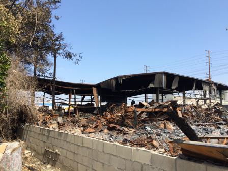 Fire gutted building and debris.